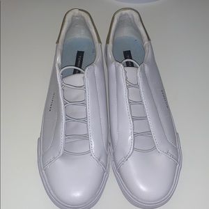 Tommy Hilfiger white slip-on sneakers